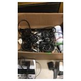 Box of miscellaneous cords and chargers