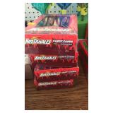 4 - 12 ct boxes of Hot Tamales candy canes.