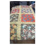 Twin size quilt.  Hand knotted. Circa 1940