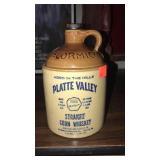 McCormick corn whiskey jug.