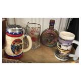 Military theme lot.  Steins.  Mug.  Decanter.