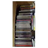 Box lot of cassette tapes and cd