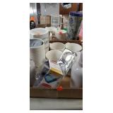 Flat of coffee mugs, soap pumps,  candle holders