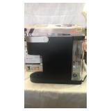 Keurig  K-Slim brewer. Powers on.