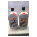 2 - 1 qt bottles Castrol 10w-30 motor oil