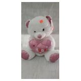 Large teddy bear with heart