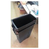 2 Black Trash Cans