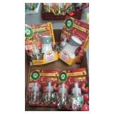 4 packages.  Air Wick. Warmers & refills.