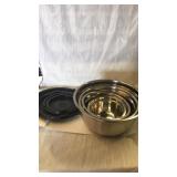 4 piece nesting metal mixing bowl set with lids.