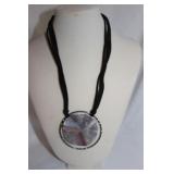 SILVER RINGER PLATE AND CORDED NECKLACE SILVER RINGER PLATE AND CORDED NECKLACE