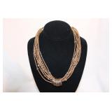 MULTI BEADED STRAND NECKLACE