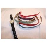 WATCH AND ASSORTED COLORED BANDS WATCH AND ASSORTED COLORED BANDS