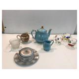 Teapot. Creamers and sugar bowls