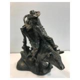 Bull rider. 12" tall. Has been repaired