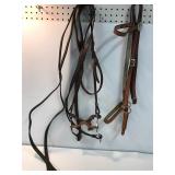 2 leather bridles one curb bit