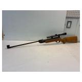 Pellet gun with scope. Good compression