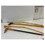 4 walking sticks made by Howard Speers.