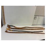 4 walking sticks made by Howard Speers.