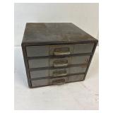 Tin cabinet with contents. 10' x 10' x 8.5' high