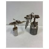 2 air paint sprayers.