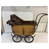 Antique metal doll carriage