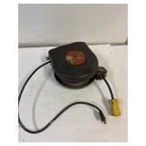 Retractable extension cord.