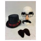 Hat. Glasses. Bow tie. Head not included