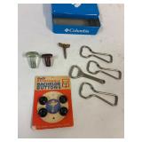 Glass stoppers. Key. Bottle openers. Buttons.
