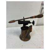 Antique torch and soldering iron.