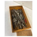 Spade bits. In a wood case.