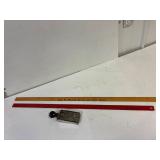 Yard sticks and pricing stamp.