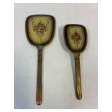Vintage hairbrush and mirror vanity set.