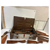 Ammo box full of gun parts