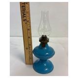 Miniature oil lamp   Tin base.