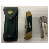 2 John Deere pocket knives; one with sheath