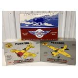 Pennzoil & Humble airplane banks in boxes