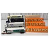 4 Winross trucks w/ boxes