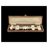 Early ornate bone bracelet w/ case