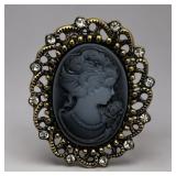 Black cameo in relief brooch