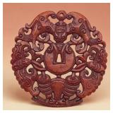 Oriental red stone dragon & phoenix pendant