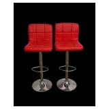 Pair red chrome base swivel stools