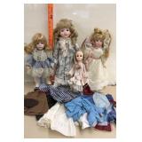 4 Porcelain Dolls and Doll Clothes