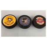 3 NHL Hockey Pucks
