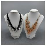 Peach lucite ball & black onyx cabochon necklaces