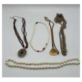 5 vintage necklaces-medallion, pearl etc