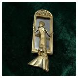 Lady in front of mirror brooch