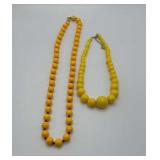 To vintage beaded yellow necklaces