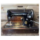 Antique singer sewing machine in case