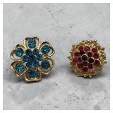 2 ruby & aquamarine crystal brooches