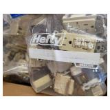 Box of reclaimed electrical outlets etc